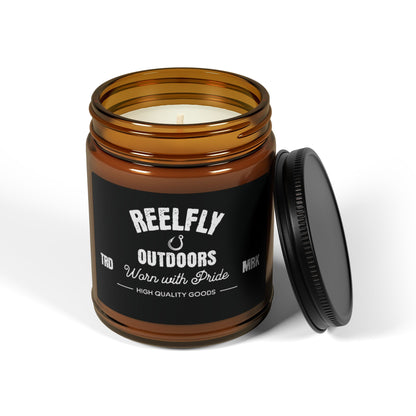 Top view of Reelfly Outdoors 9oz Trademark Candle with white background.